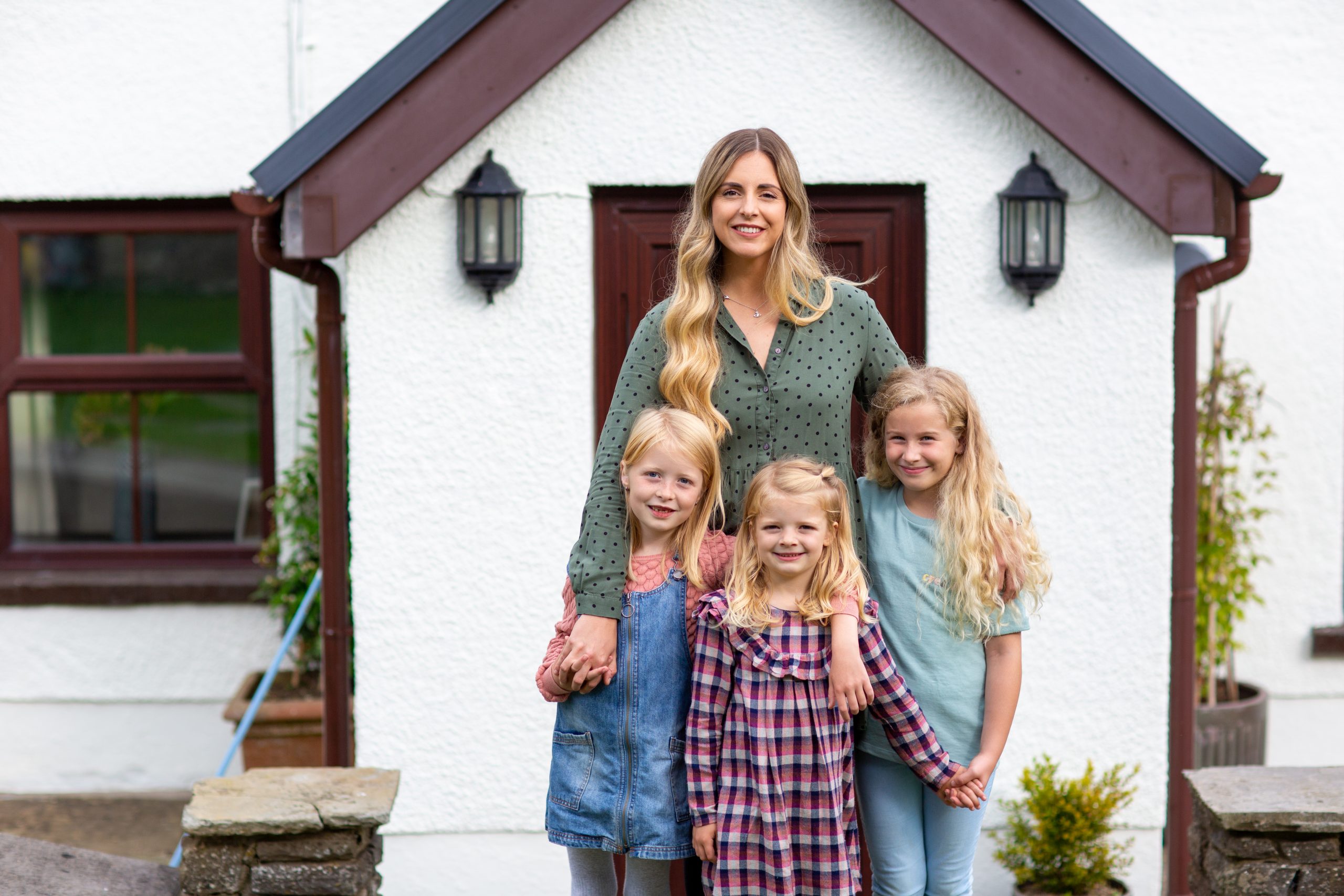 A woman with three girls